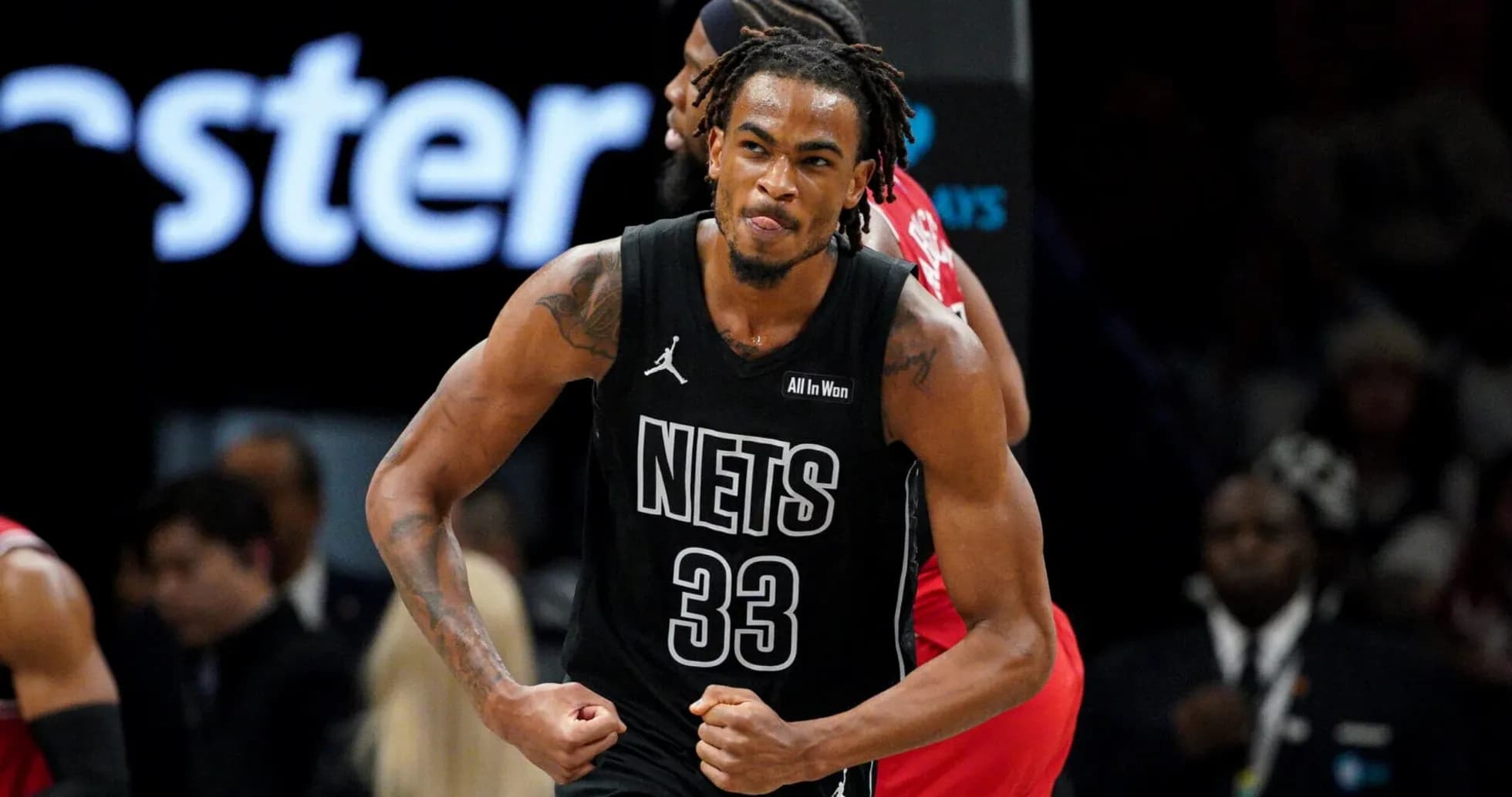 Player celebrating after a successful play for Nets Player celebrating after a successful play for Nets