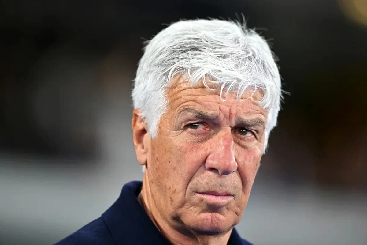 Coach with gray hair during match observation Coach with gray hair during match observation