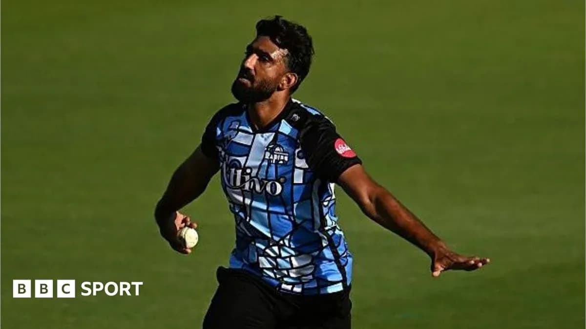 Cricketer bowling during a match on the field Cricketer bowling during a match on the field