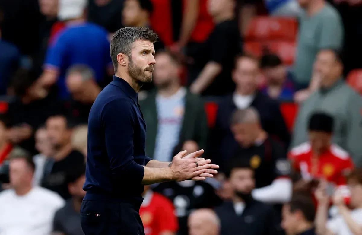 Manager clapping during match at stadium Manager clapping during match at stadium