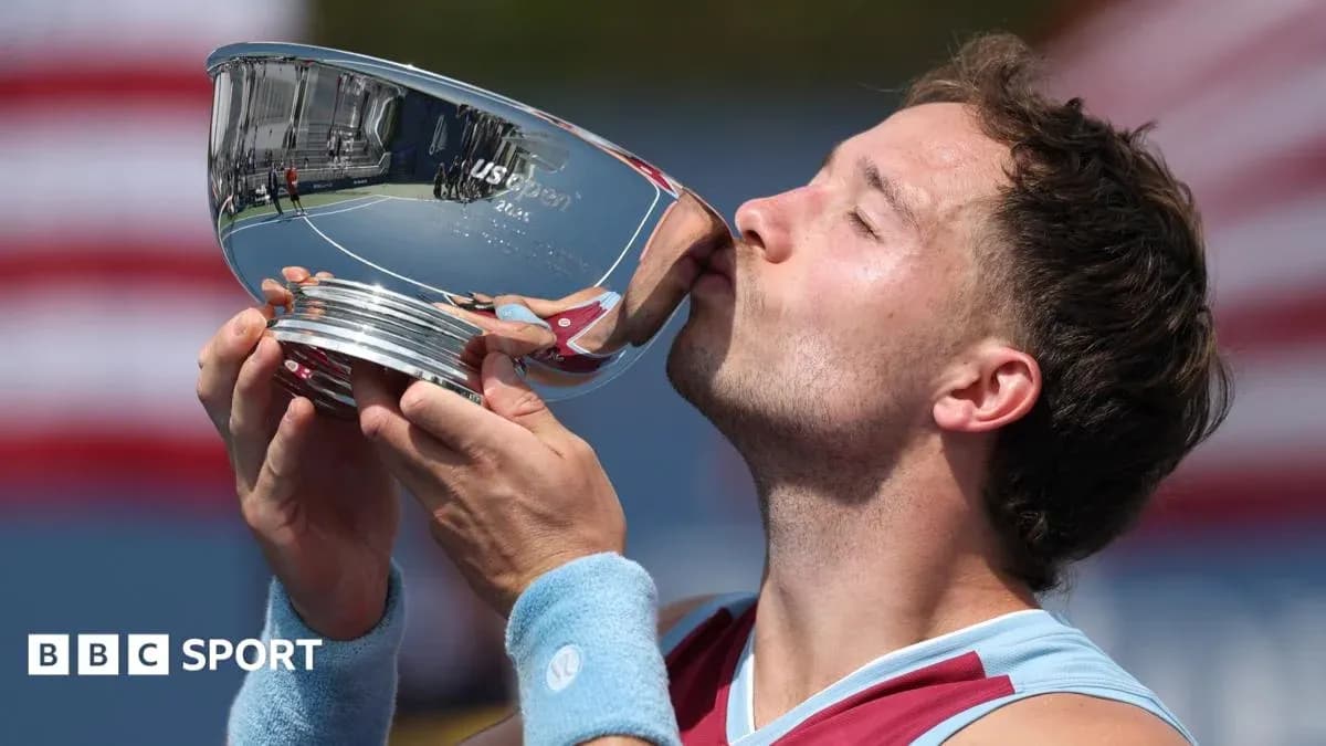 Player kissing US Open trophy on court Player kissing US Open trophy on court