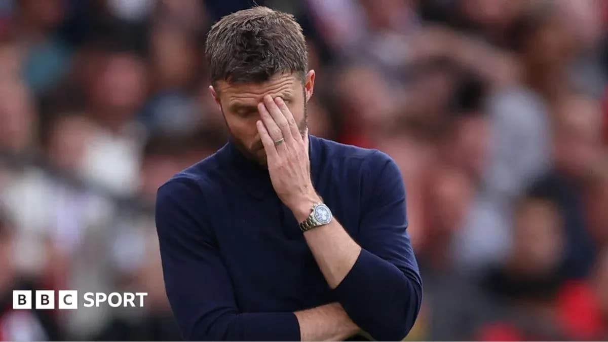 Coach with hand on face during match Coach with hand on face during match