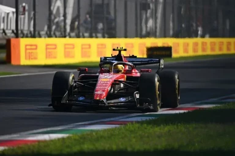 Ferrari Formula 1 car racing on track Ferrari Formula 1 car racing on track