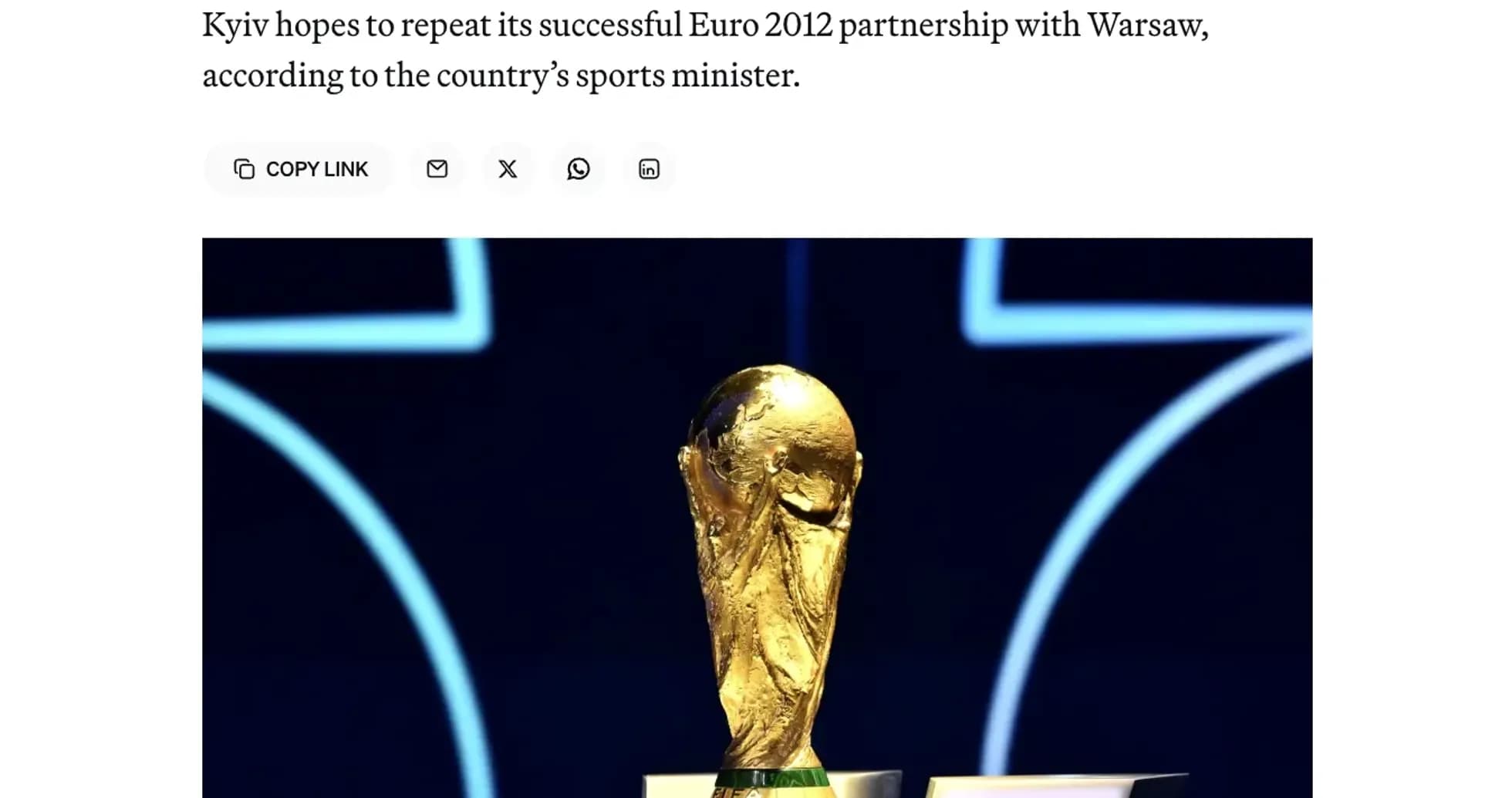 FIFA World Cup trophy displayed on podium FIFA World Cup trophy displayed on podium