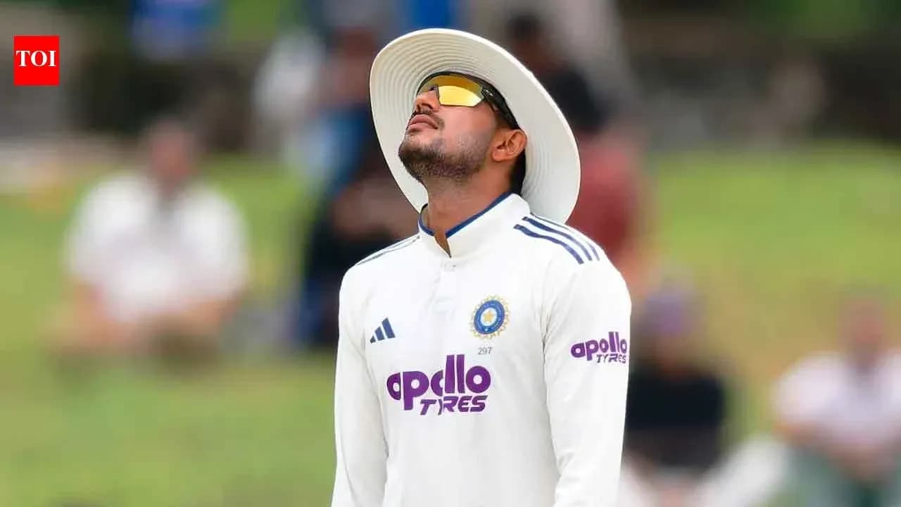 Cricketer looking up during a match Cricketer looking up during a match