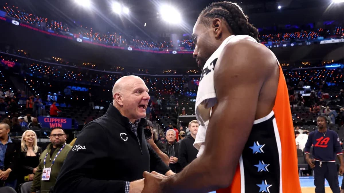 Kawhi Leonard and team owner celebrating post-game Kawhi Leonard and team owner celebrating post-game