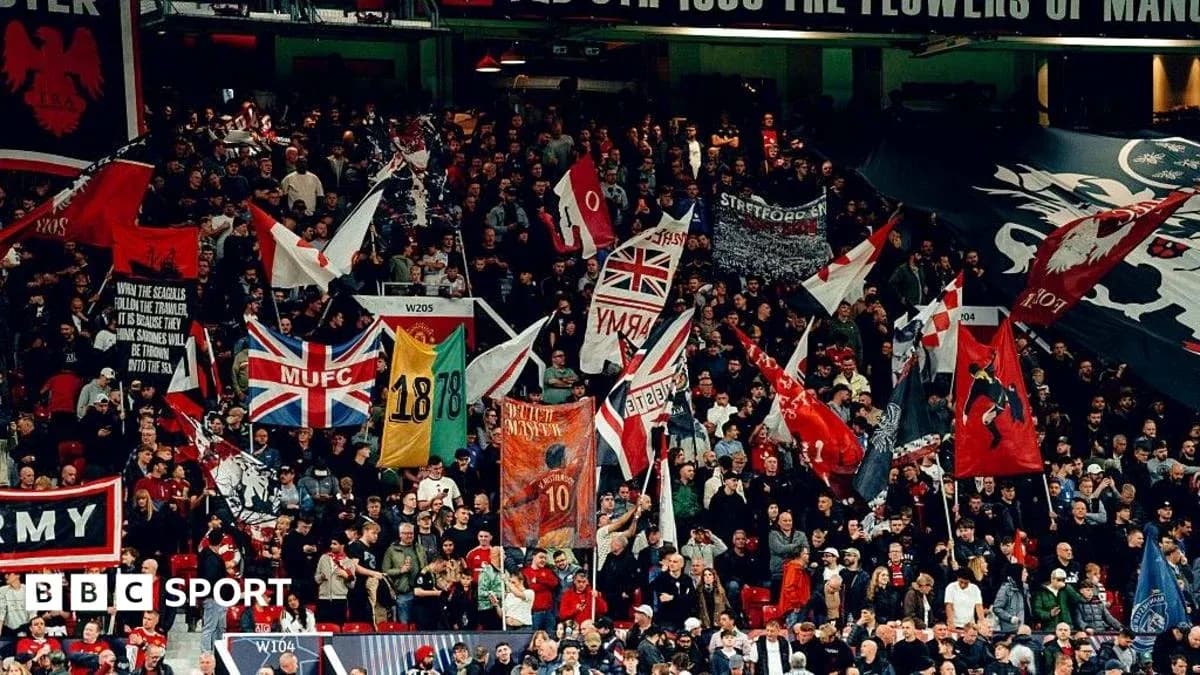Crowd holding flags and banners in stadium Crowd holding flags and banners in stadium