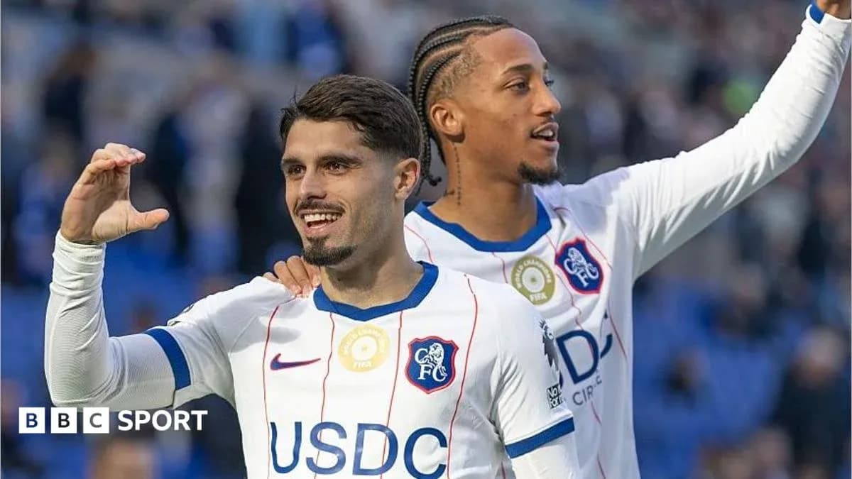 Two players celebrating on the field after a match Two players celebrating on the field after a match