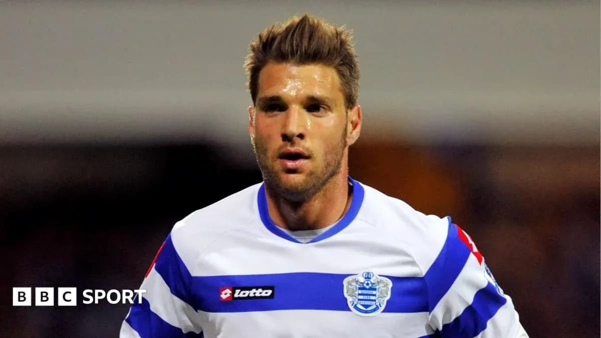 Player in QPR jersey during match action Player in QPR jersey during match action