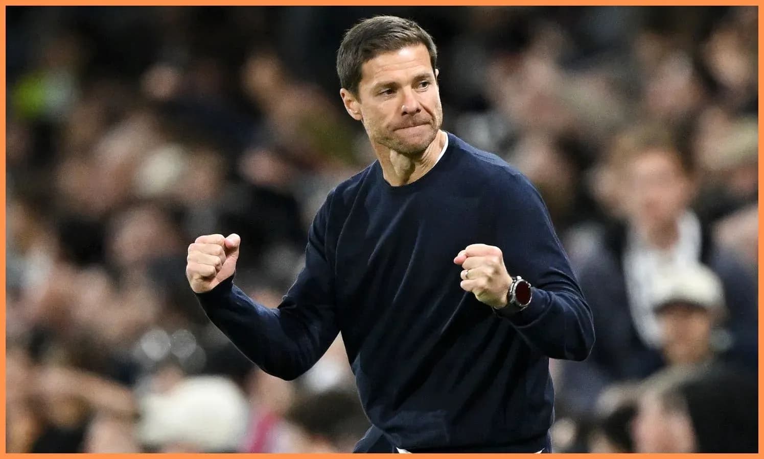 Coach celebrating with clenched fists on sidelines Coach celebrating with clenched fists on sidelines