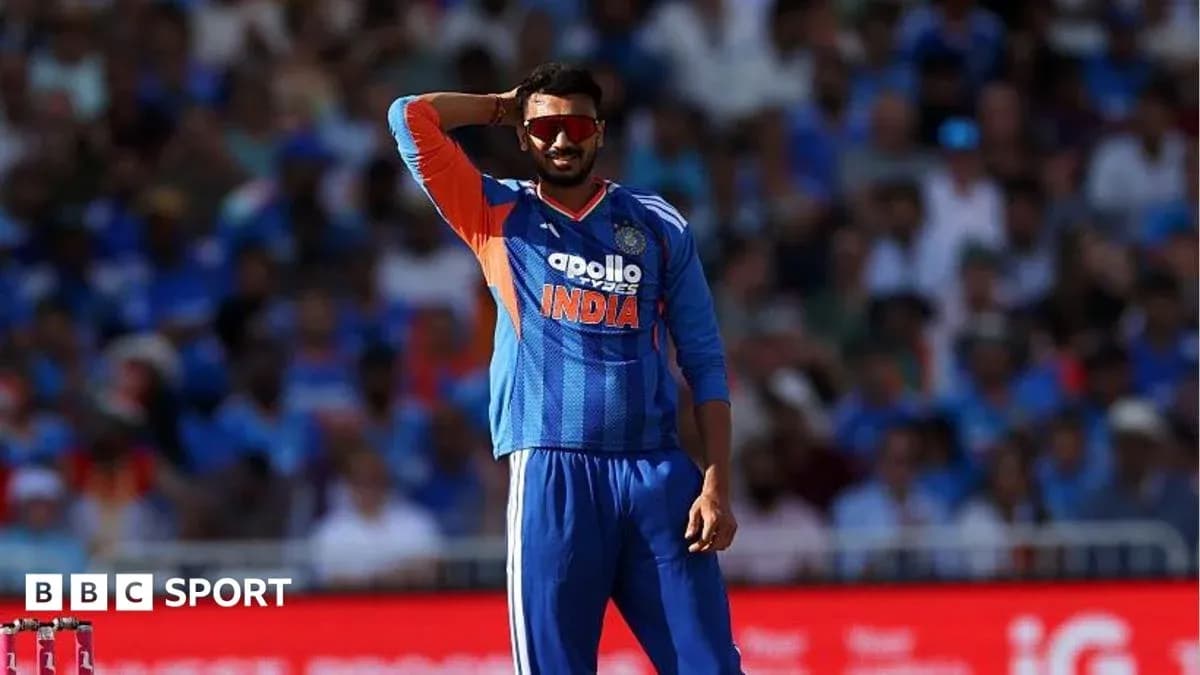 Cricketer in blue uniform gesturing during match Cricketer in blue uniform gesturing during match