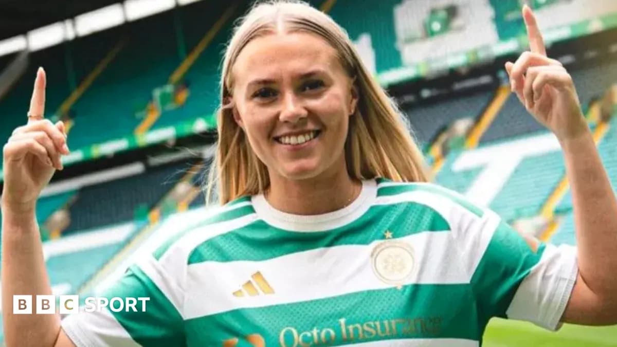 Player celebrating in Celtic kit at stadium Player celebrating in Celtic kit at stadium