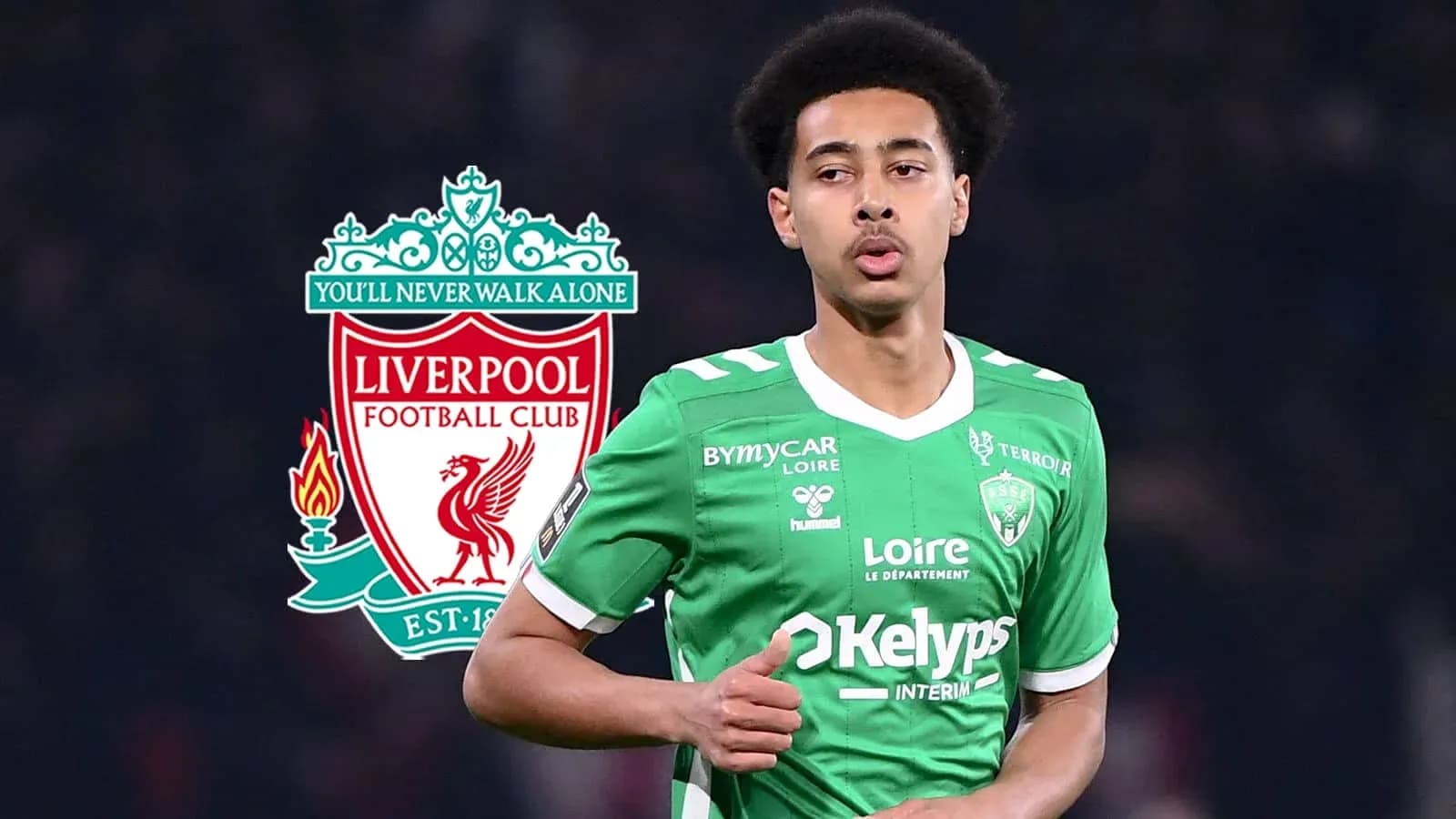 Player wearing green jersey with Liverpool logo background Player wearing green jersey with Liverpool logo background