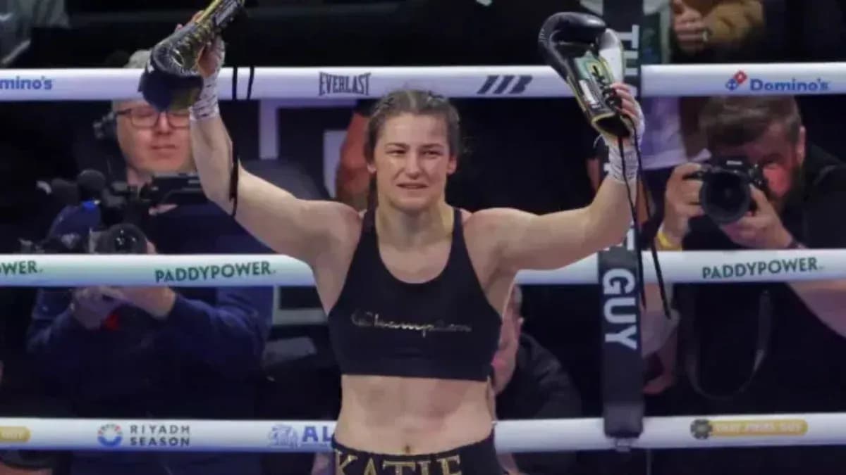 Female boxer celebrating victory in the ring Female boxer celebrating victory in the ring