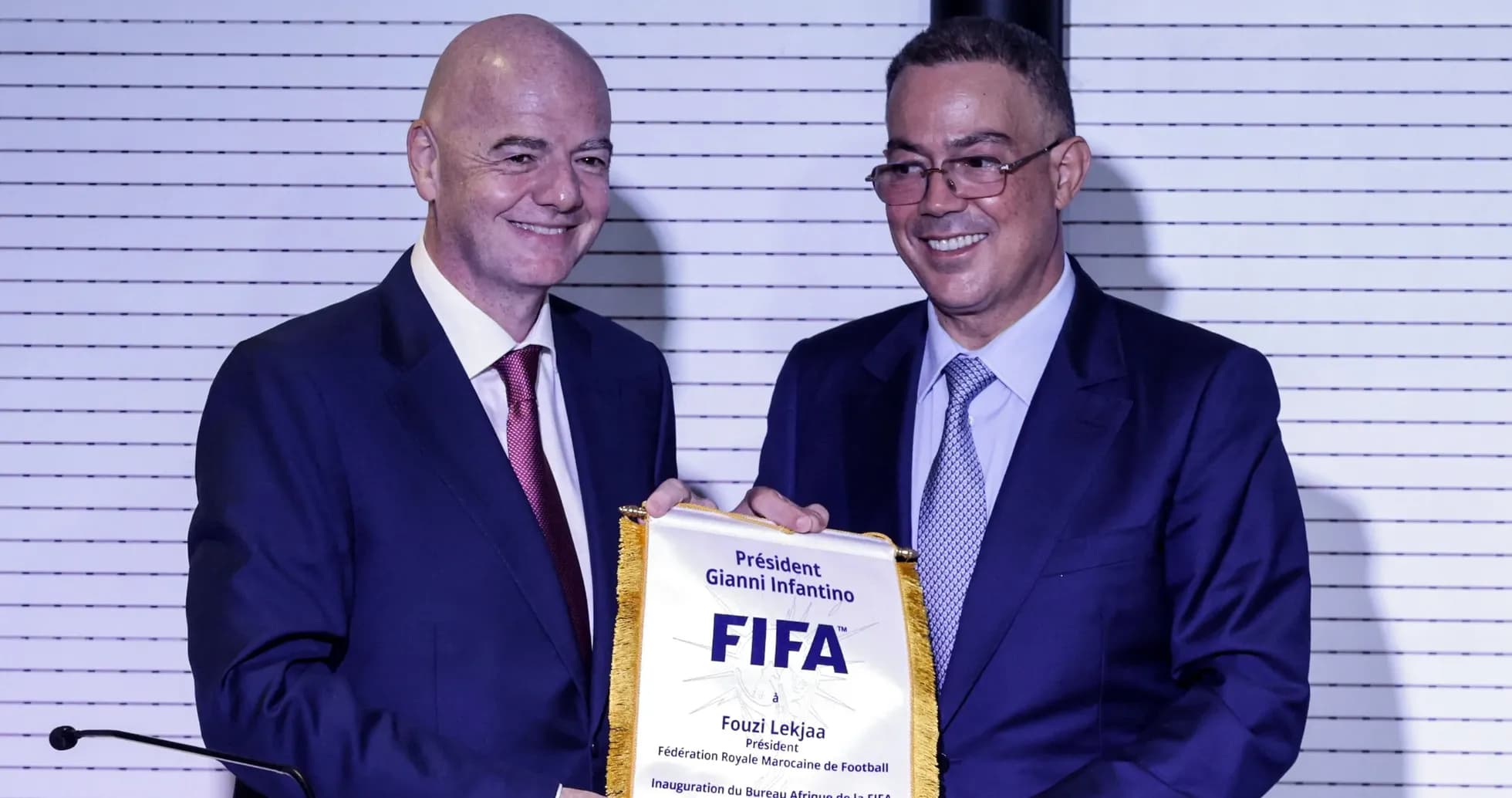 Gianni Infantino presenting plaque to Fouzi Lekjaa Gianni Infantino presenting plaque to Fouzi Lekjaa