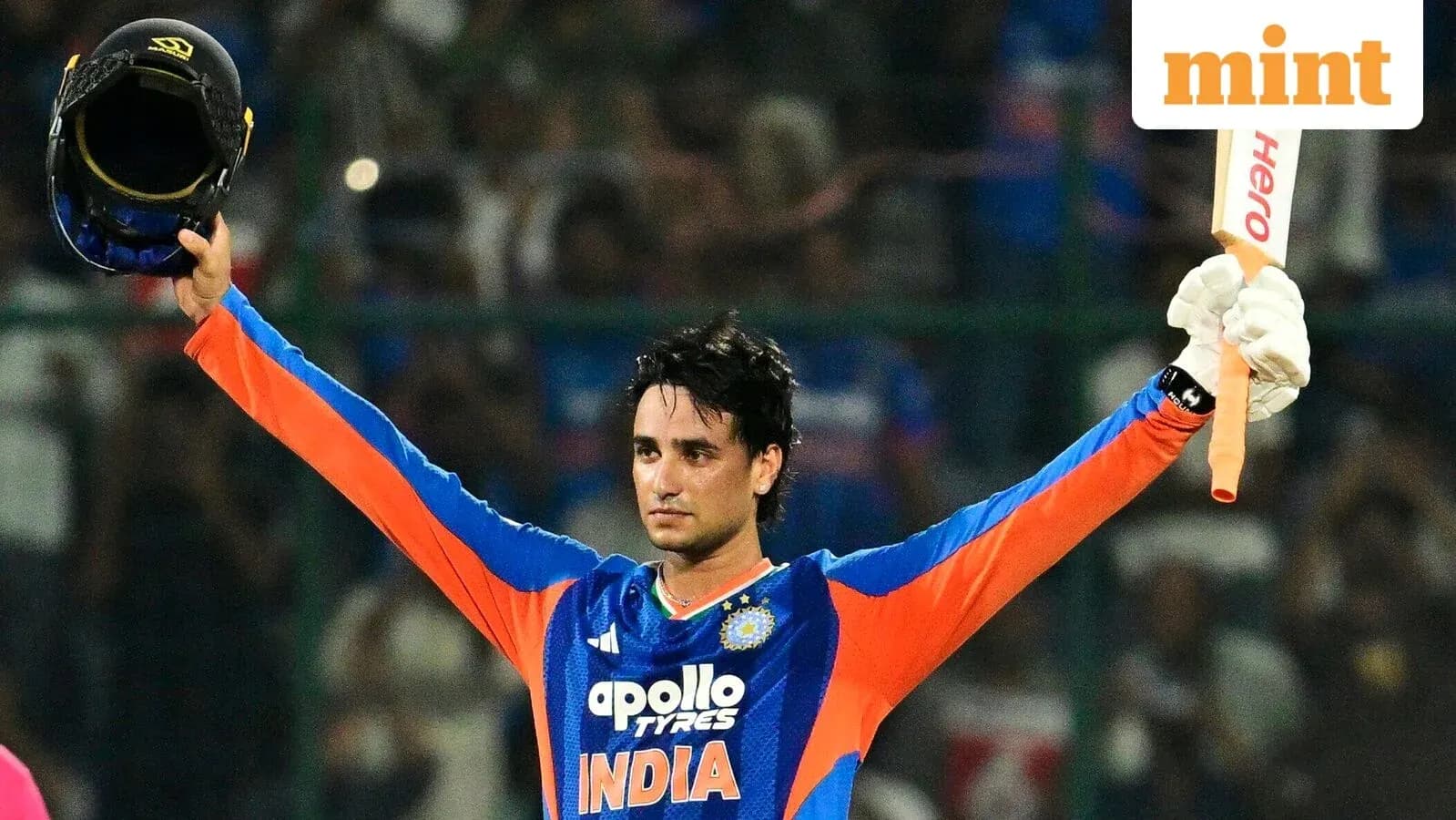 Cricketer celebrating after scoring a century Cricketer celebrating after scoring a century