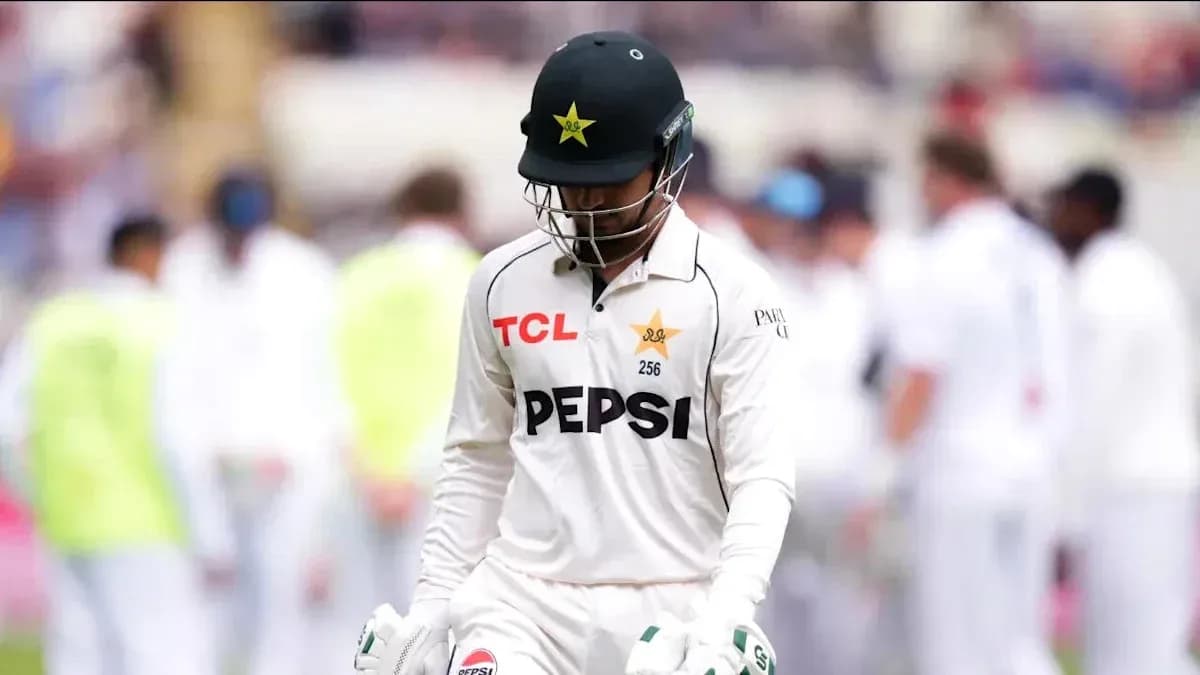 Pakistani cricketer walking off the field after dismissal Pakistani cricketer walking off the field after dismissal