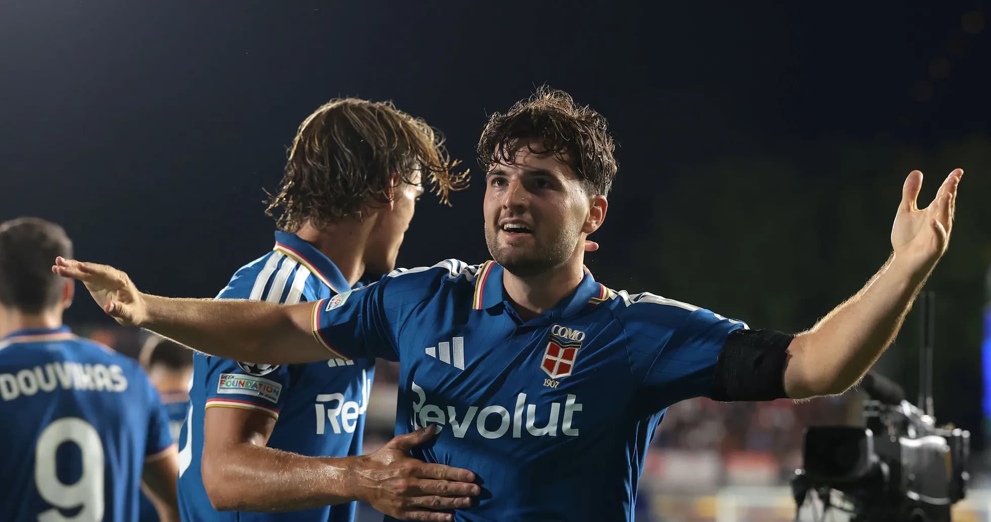 Player celebrating with teammates after scoring a goal Player celebrating with teammates after scoring a goal