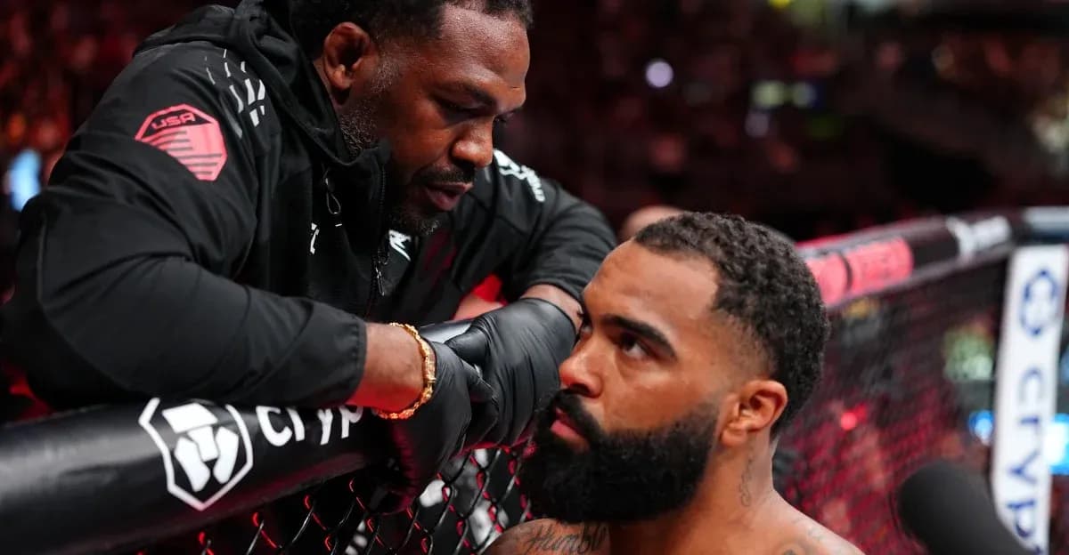 Coach advising fighter in MMA octagon corner Coach advising fighter in MMA octagon corner
