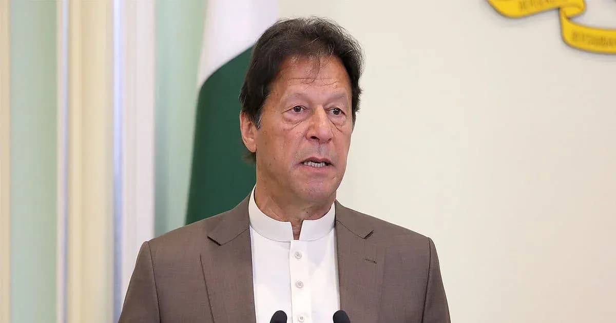 Man speaking at a podium with flags in background Man speaking at a podium with flags in background