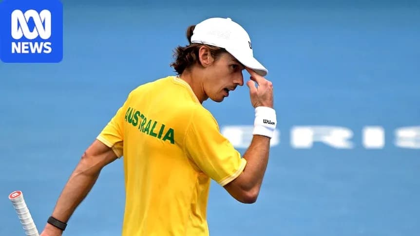 Tennis player in Australia jersey celebrating on court Tennis player in Australia jersey celebrating on court
