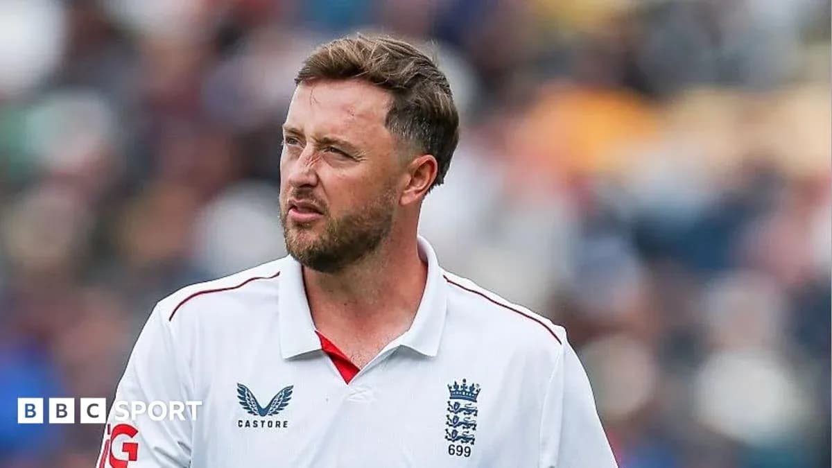 Cricketer in England kit on field during match Cricketer in England kit on field during match