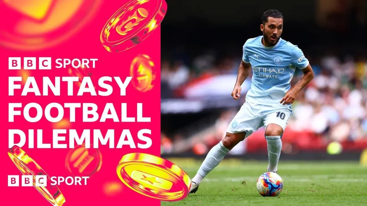 Player in light blue kit dribbling during match Player in light blue kit dribbling during match
