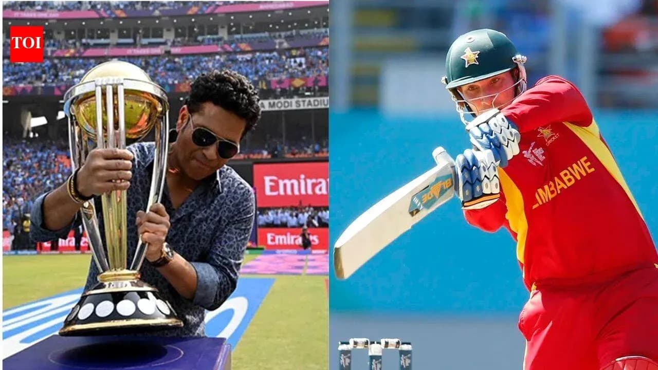 Sachin Tendulkar holding cricket World Cup trophy Sachin Tendulkar holding cricket World Cup trophy