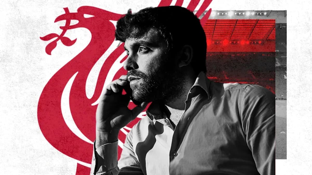 Man on phone with Liverpool logo background Man on phone with Liverpool logo background