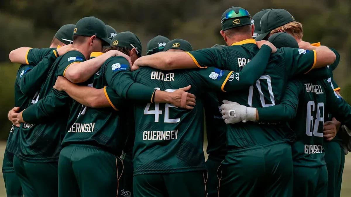 Cricket team huddled together before match Cricket team huddled together before match
