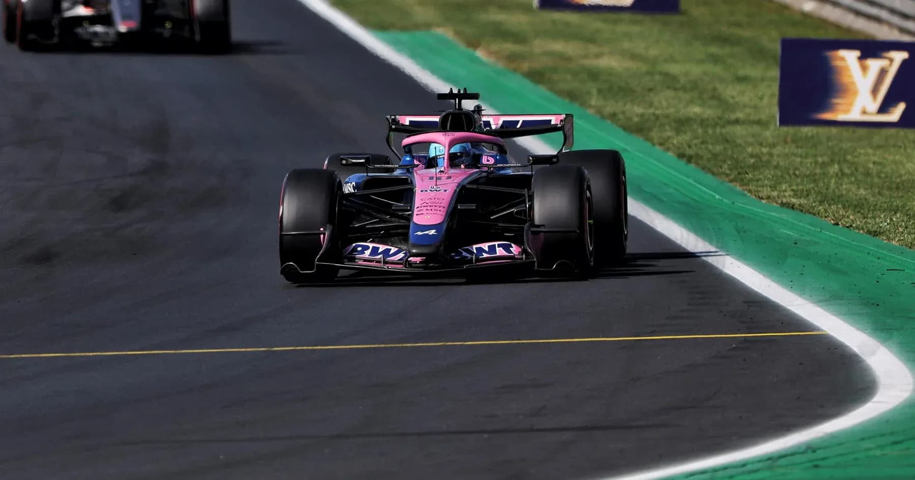 Racing car on track during Formula 1 event Racing car on track during Formula 1 event