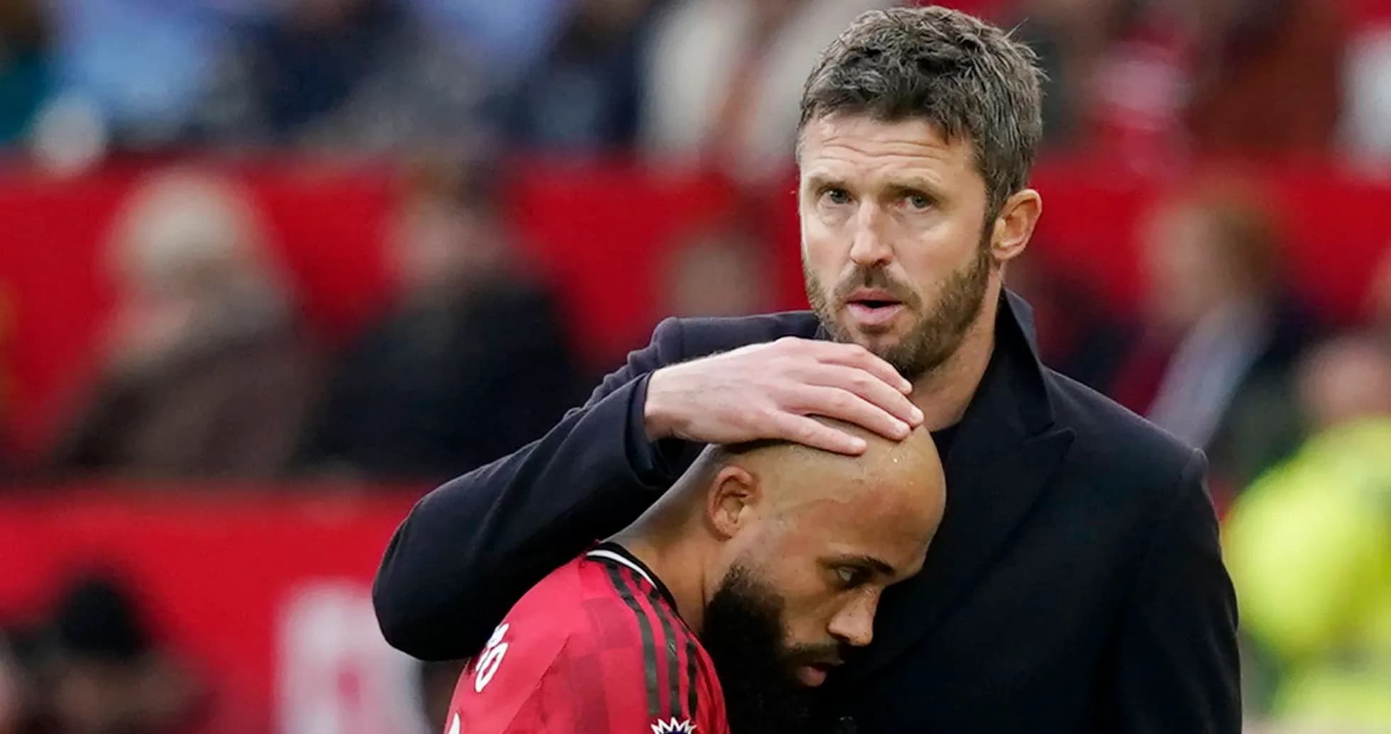 Coach comforting player on the sideline Coach comforting player on the sideline