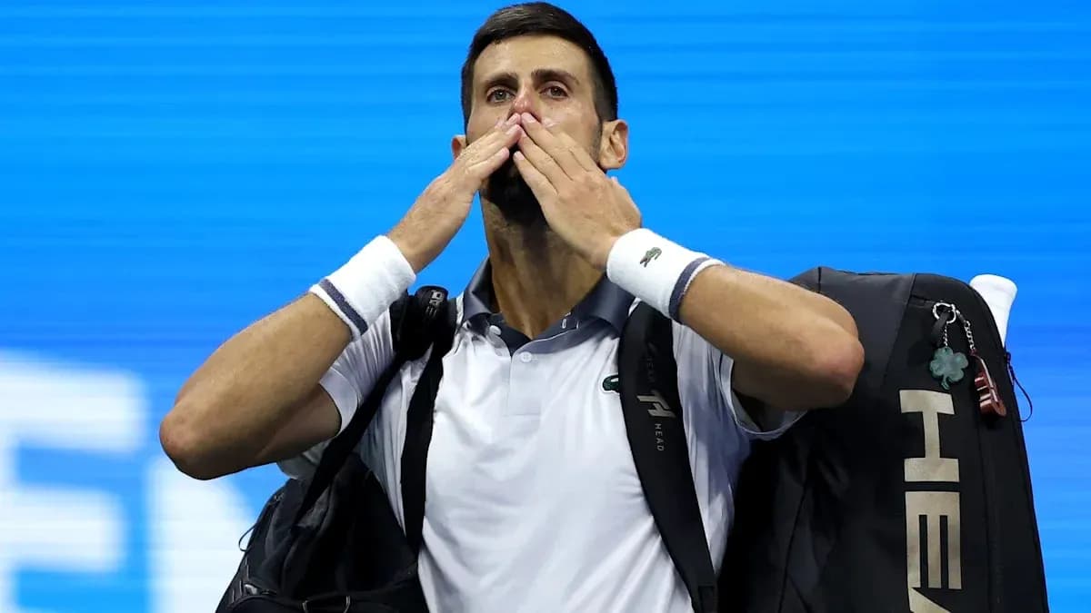 Tennis player blowing kisses while leaving court Tennis player blowing kisses while leaving court