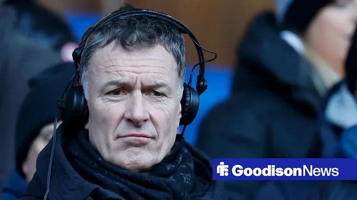 Man wearing headphones at a sports event Man wearing headphones at a sports event