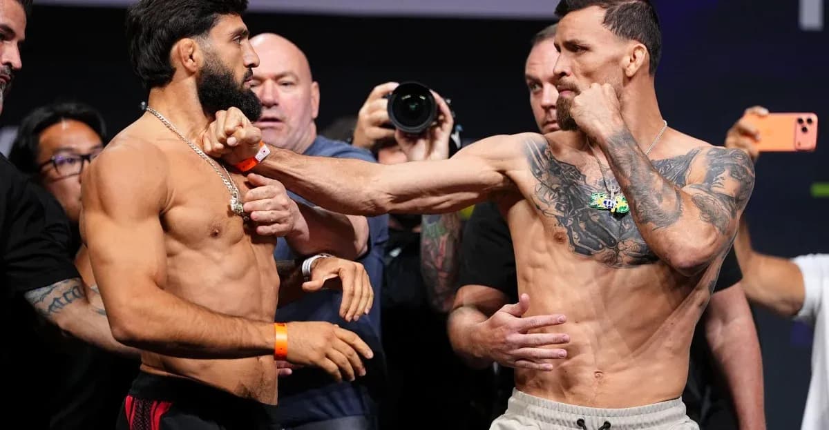 Two fighters face off during weigh-in event Two fighters face off during weigh-in event