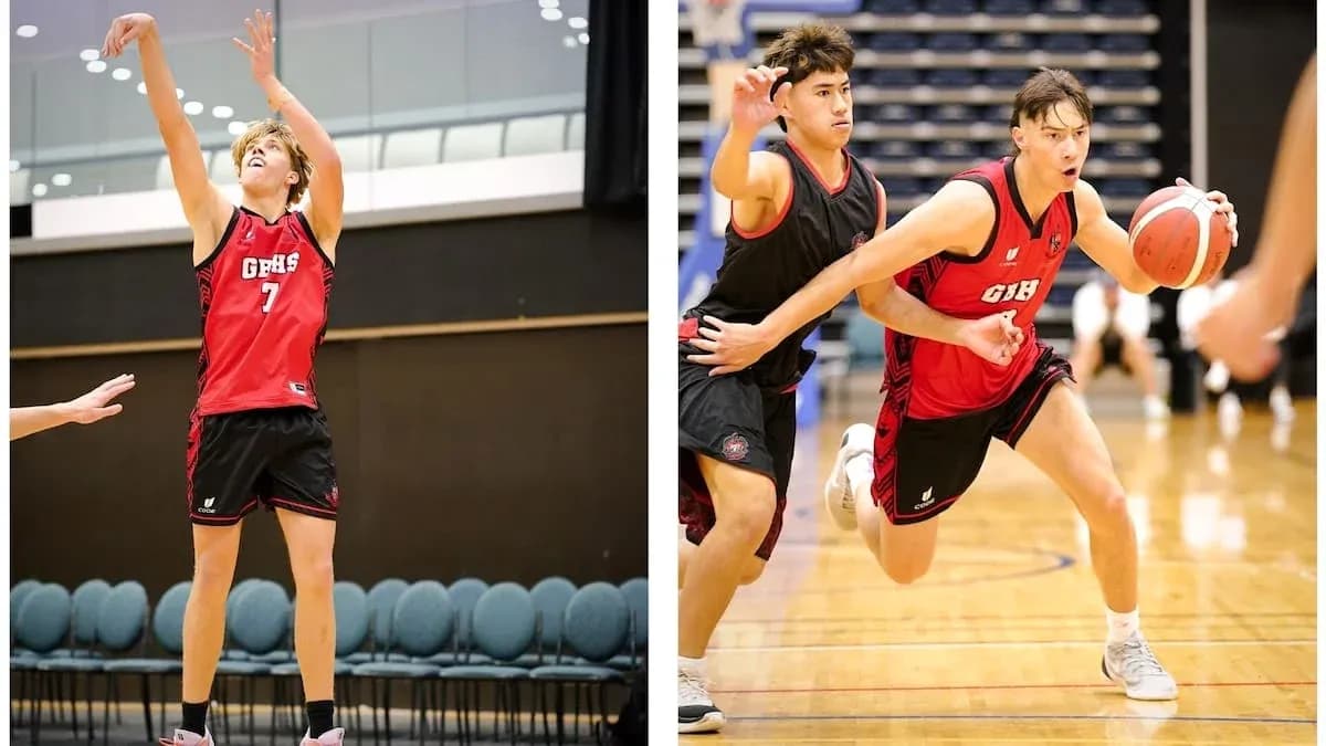 Two basketball players in action during practice Two basketball players in action during practice