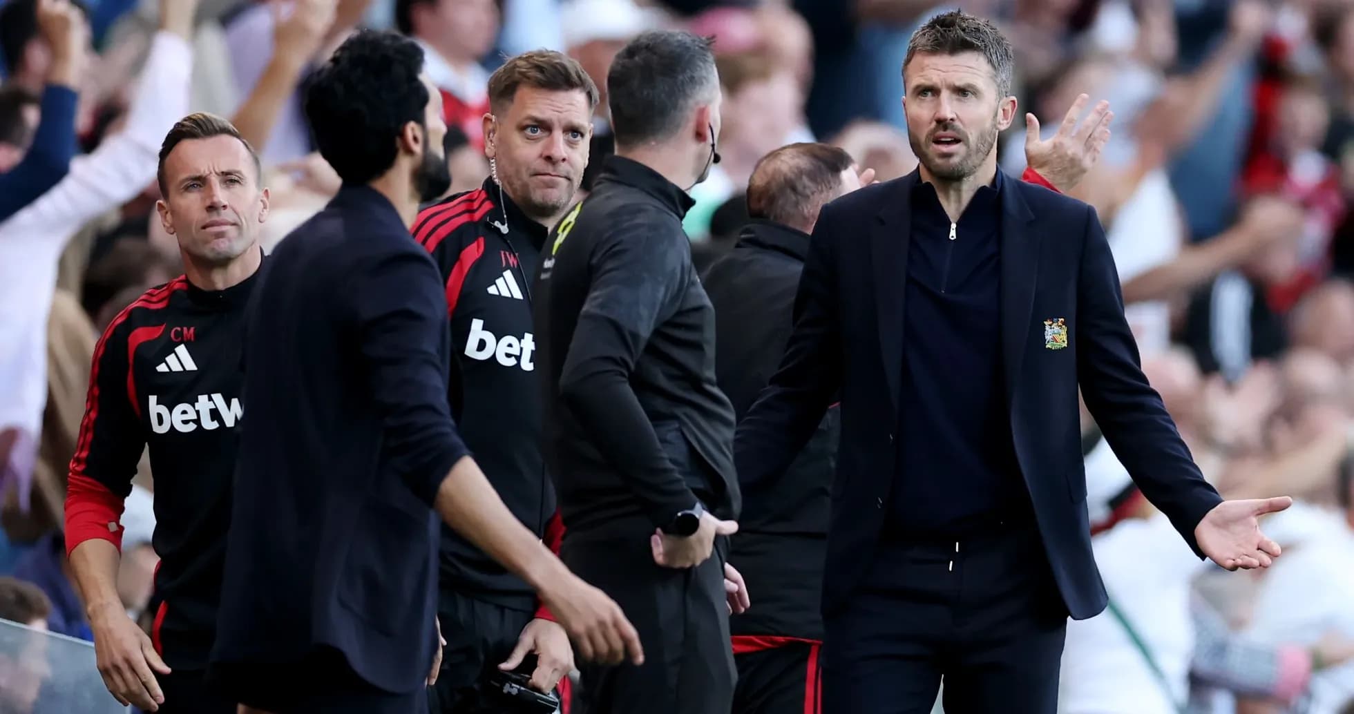 Coaching staff reacting during a match on sidelines Coaching staff reacting during a match on sidelines