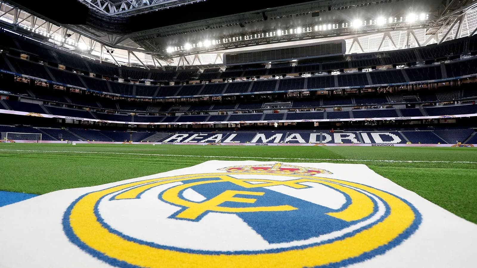 Real Madrid logo on the pitch at stadium Real Madrid logo on the pitch at stadium