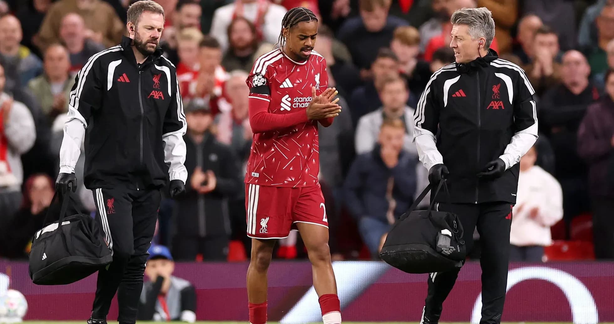 Liverpool player receiving medical attention off the field Liverpool player receiving medical attention off the field