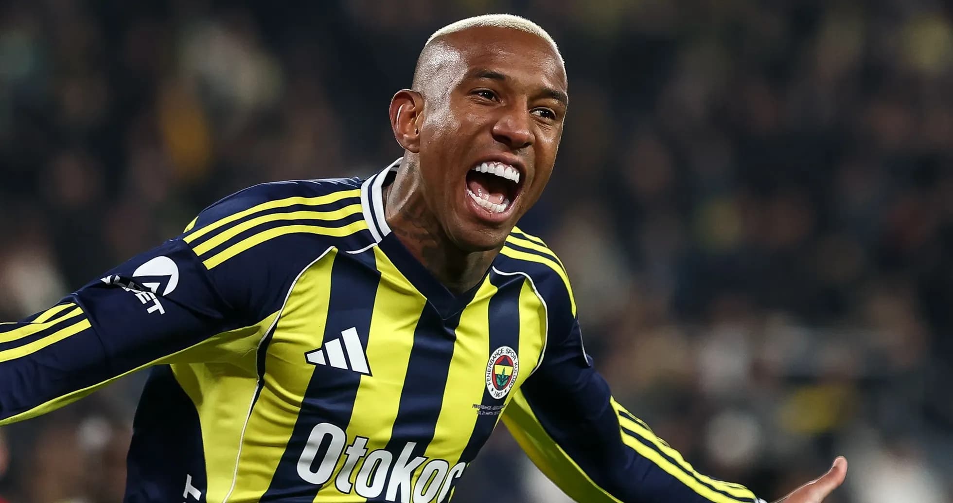 Fenerbahçe player celebrating a goal on the field Fenerbahçe player celebrating a goal on the field