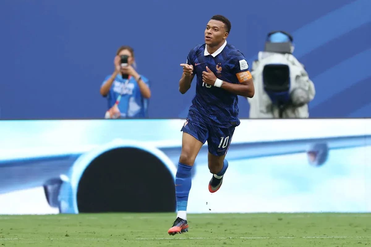 Player celebrating after scoring a goal for France Player celebrating after scoring a goal for France