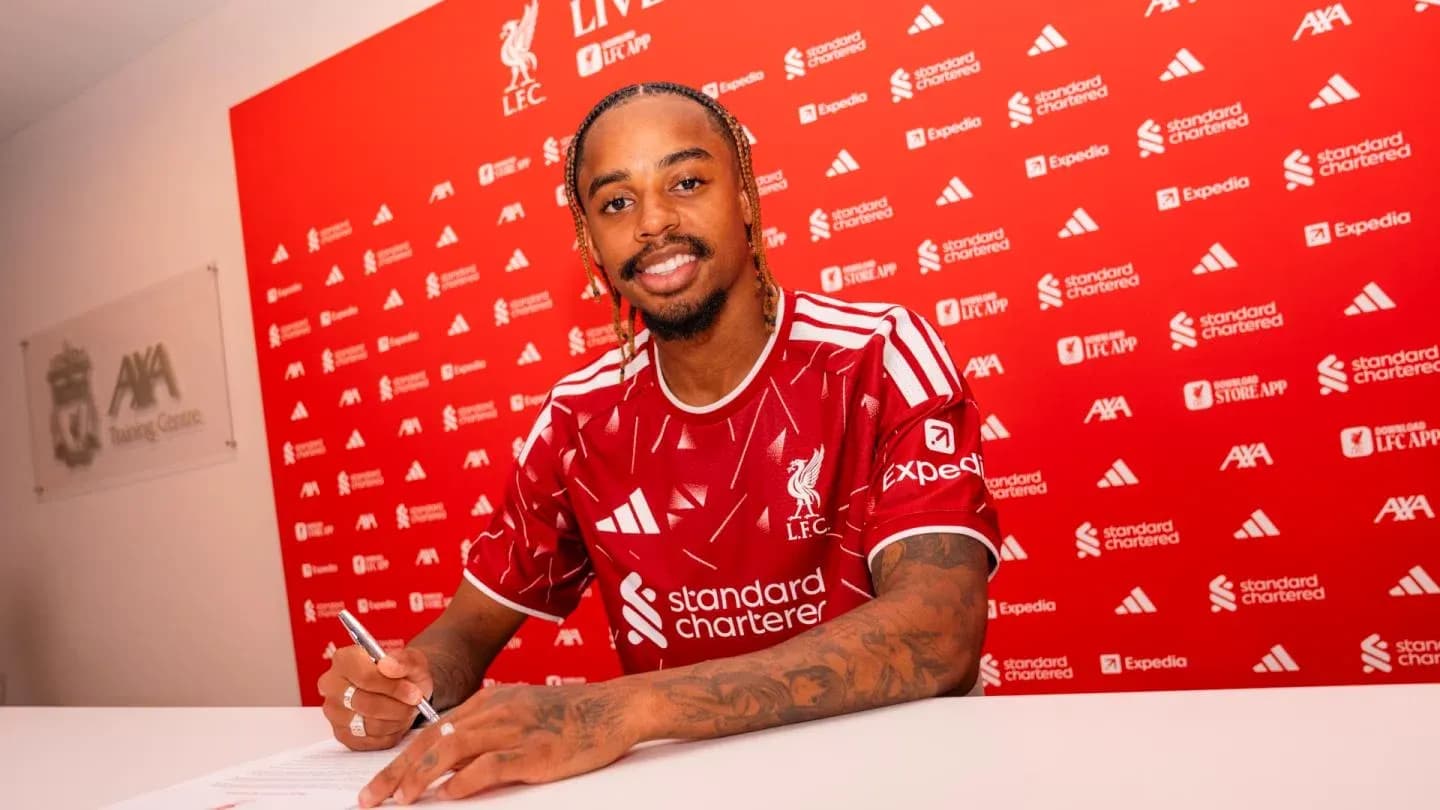 Player signing contract at Liverpool FC announcement event Player signing contract at Liverpool FC announcement event