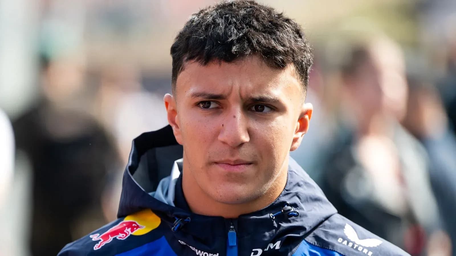 Driver in Red Bull jacket during event Driver in Red Bull jacket during event