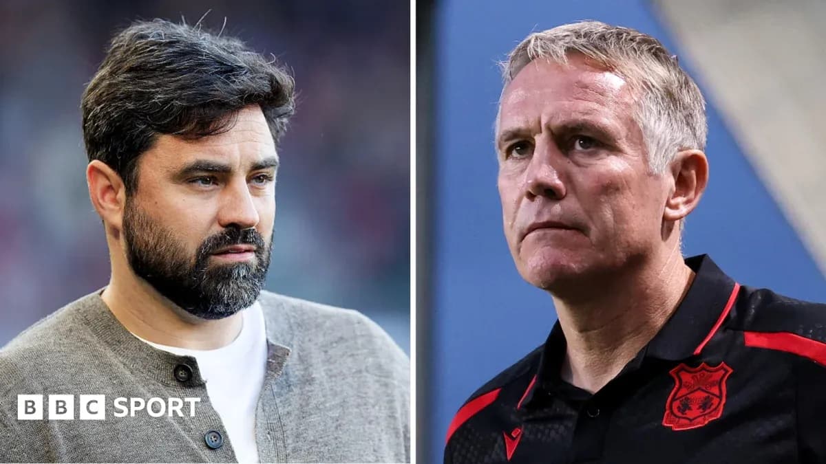 Two football managers during a pre-match discussion Two football managers during a pre-match discussion